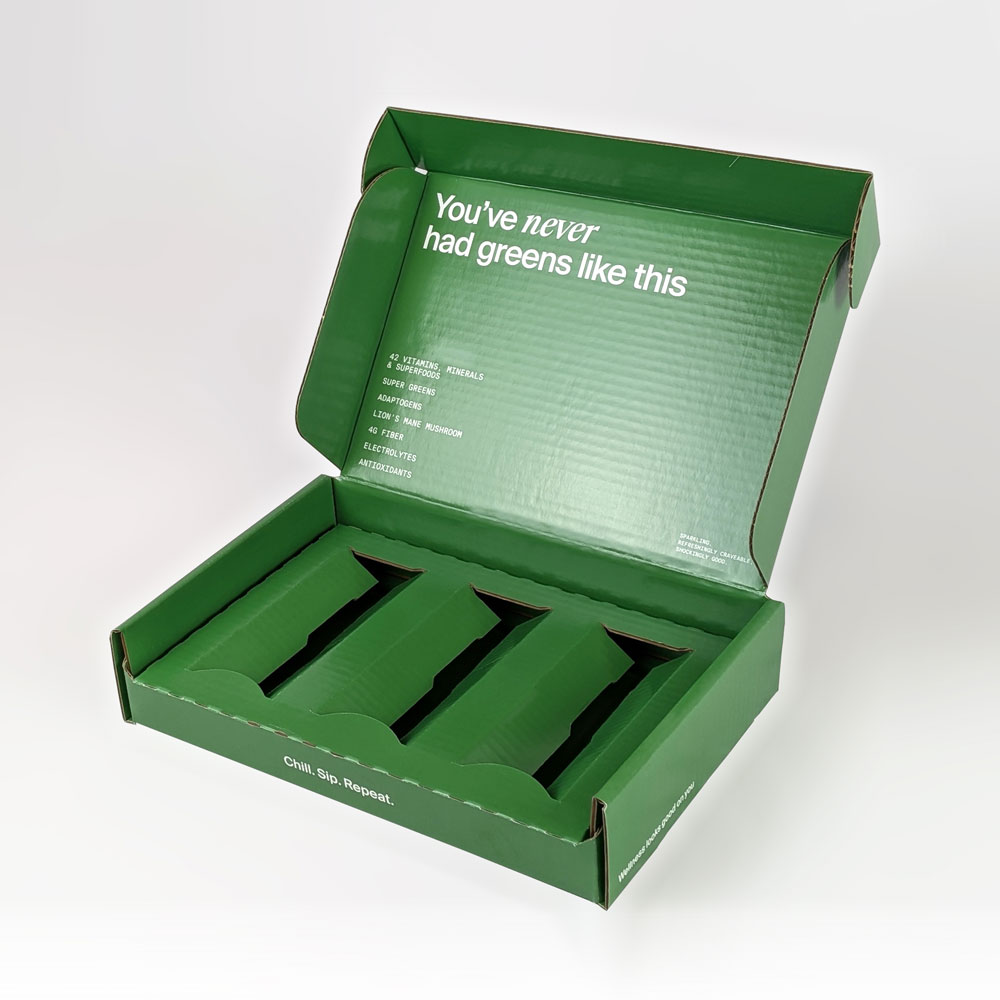 Open green packaging box featuring nutritional highlights and a catchy slogan for e-commerce greens product.